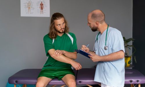front-view-athlete-talking-physiotherapist_23-2149866131